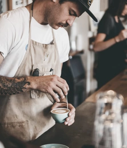 A man making coffee with passion